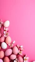 Colorful eggs with copyspace on pink background. Easter egg concept, Spring holiday photo