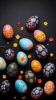 Colorful eggs with copyspace on black background. Easter egg concept, Spring holiday photo