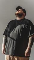 Big size fat adult man model in Blank black T Shirt for design mockup photo