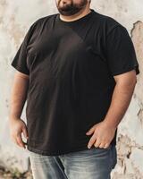 Big size fat adult man model in Blank black T Shirt for design mockup photo