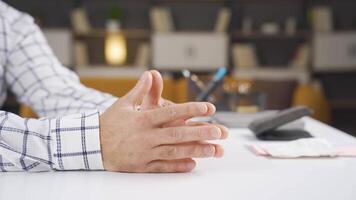 Close-up hands of thoughtful man. video