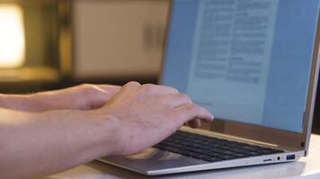 Close-up hands of man working on laptop. video