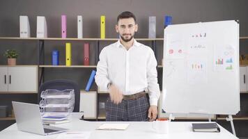 Businessman doing required exercises in office. video