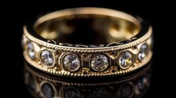 Wedding gold ring with diamonds on a black background close up Selective focus photo