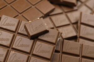 KHARKIV, UKRAINE - JANUARY 27, 2021 Alyonka chocolate square bars - product from Red October chocolate factory photo