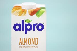 KHARKIV, UKRAINE - JANUARY 2, 2021 Alpro almond vegetarian milk pack produced by European company based in Wevelgem photo