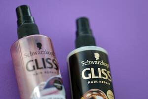 KYIV, UKRAINE - OCTOBER 31, 2023 Schwarzkopf Gliss hair repair products, split hair miracle and ultimate repair spray bottles. Schwarzkopf beauty branch founded by Hans Schwarzkopf photo