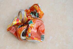 KYIV, UKRAINE - 4 MAY, 2023 Mirinda orange drink in orange citrus tin can with classic design and logo photo