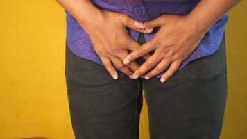 the concept of prostate and bladder problem, crotch pain of a young person video