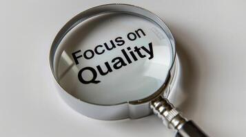 Symbolizing Quality Assurance, Magnifying Glass Focused on Focus on Quality Phrase Against White Background photo