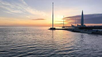 SAINT-PETERSBURG, RUSSIA View of The Gulf of Finland, sunset, 300 years St. Petersburg Anniversary Park and Lakhta Center photo