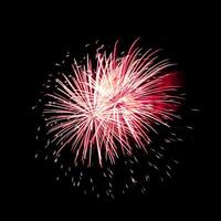 Colorful celebration fireworks isolated on black sky background. photo