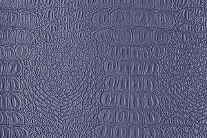 Blue crocodile leather texture. Abstract backdrop for design. photo