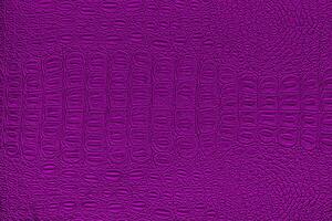 Purple crocodile leather texture. Abstract backdrop for design. photo