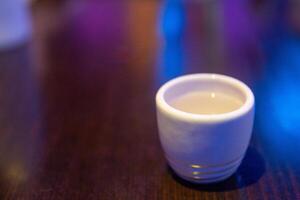 Sake shot in a lounge photo