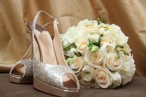 Rhinestone heels and bouquet photo