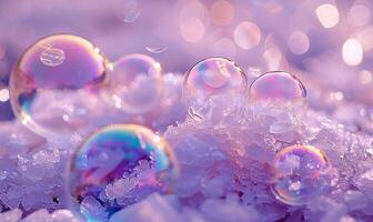 Iridescent soap bubbles trapped on crushed ice, reflecting a blurry purple surface photo