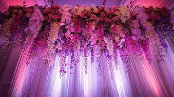 The wedding background and room for studio photos are filled with beautiful flower decorations