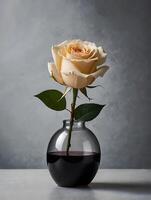 yellow rose in a vase on grey background photo