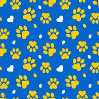 Yellow paws of a cat or dog on a blue background form a seamless pattern. vector