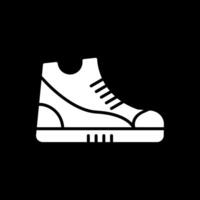 zapatilla de deporte glifo invertido icono diseño vector