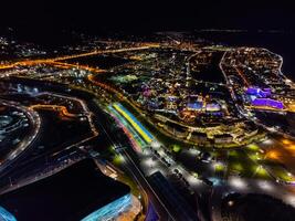 A view of nighttime Sochi from the air photo