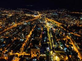 A view of nighttime Sochi from the air photo