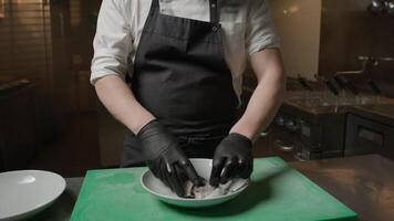 Chef Is Cleaning A Cuttlefish To Extract Black Ink Juice video