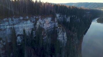 A tourist complex located in the Sortavalsky district of the Republic of Karelia. Clip. A drone photo showing a former marble quarry and forest filled with groundwater. video