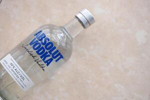 KYIV, UKRAINE - NOVEMBER 27, 2023 Absolut Vodka swedish brand bottle of alcohol vodka drink photo