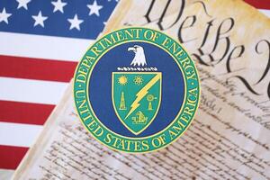 KYIV, UKRAINE - MARCH 9, 2024 US Department of Energy seal with United States Constitution on flag photo