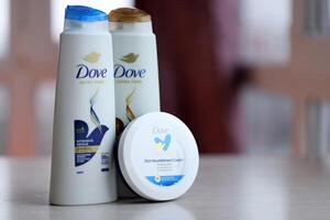 KYIV, UKRAINE - FEBRUARY 27, 2024 Production of Dove is a personal care brand by Unilever photo
