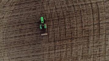 Tractor Working in Agriculture Field Aerial View video