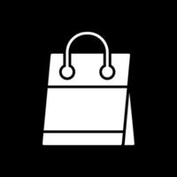 compras bolso glifo invertido icono diseño vector