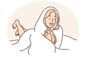 Laughing woman wrapped in blanket lies on bed not wanting to get up and go to work or college vector