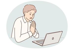 Man manager prays sitting at table with laptop asking god for help after making mistakes in project vector