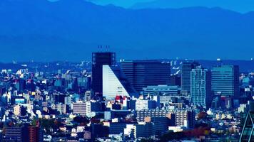 A timelapse of cityscape in Tokyo high angle long shot panning video