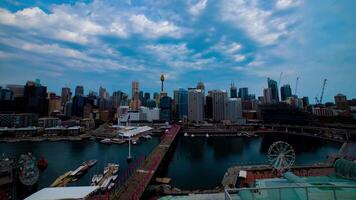 un lapso de tiempo de panorámico área de la bahía a querido puerto en Sydney alto ángulo amplio Disparo video