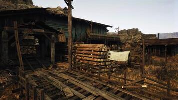 An abandoned shack with a stack of firewood in front video