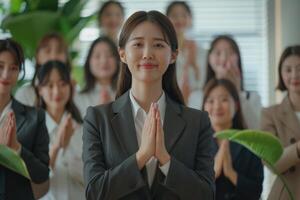 AI generated Asian businesswoman receives team appreciation and support for work. photo