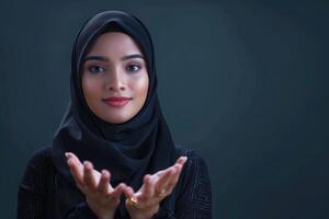 AI generated Asian Muslim woman presenting product with hands in empty space. photo