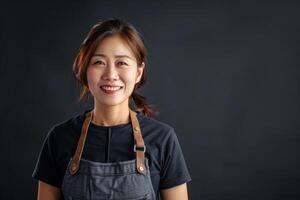 AI generated Happy  confident Asian female worker in apron. photo