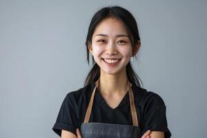 AI generated Happy  confident Asian female worker in apron. photo