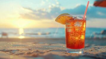 Refreshing summer drink with beach backdrop. photo