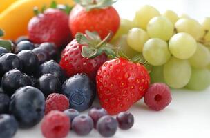 Assorted fresh berries close up photo