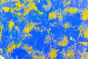 Abstract background with a textured surface for design made from putty and oil paint photo