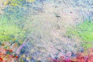 Abstract background with a textured surface for design made from putty and oil paint photo