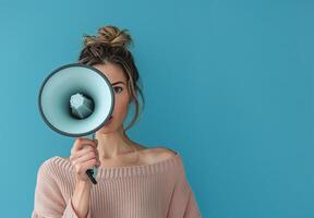 Business and marketing theme with woman and megaphone loudspeaker for announcements and promotion. photo