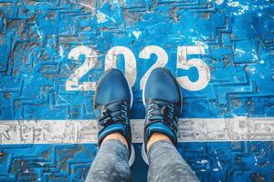 The beginning of 2025 is written on a colorful road. Conceptual photo of the coming New Year 2025. New year concept, motivation, business promotion, step forward, moving forward, hope