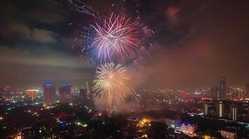 festivo fuegos artificiales en el noche cielo a un celebracion evento en honor de un aniversario o nuevo año foto